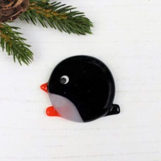 Handmade fused glass penguin brooch with beak flipper and tail