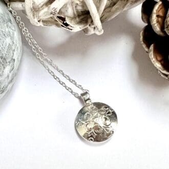 Silver snowflake necklace, Handmade domed circle pendant