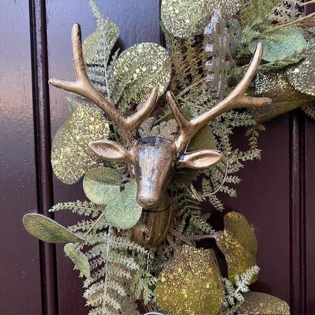 Gold-and-green-wreath-with-stag
