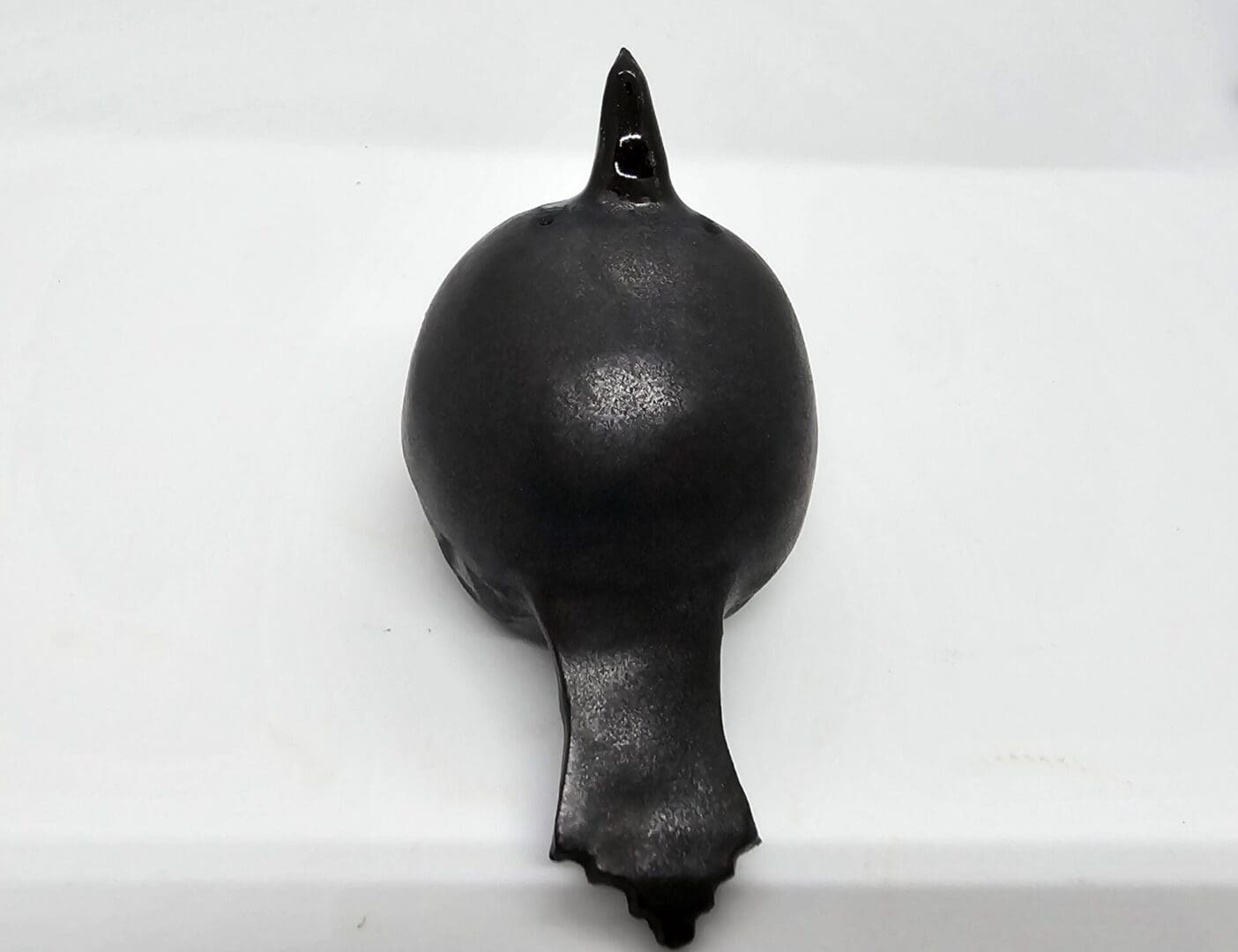 Back view of ceramic crow