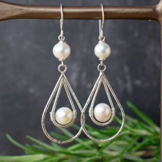 silver dangle earrings with teardrop shape wire and pearls