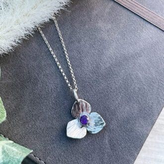 sterling silver flower necklace with amethyst gemstone