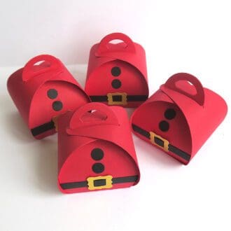 Four Christmas Santa boxes for table favours