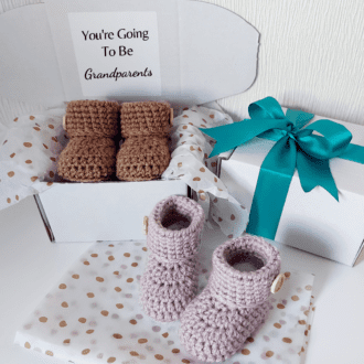 You're going to be Grandparents Pregnancy Announcement box including a pair of handmade newborn baby booties