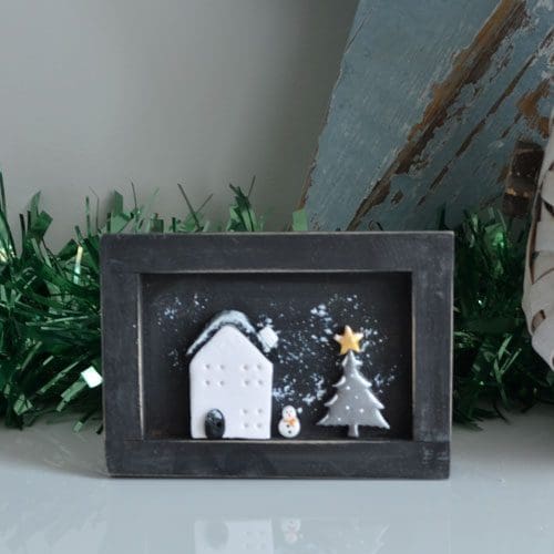 Handmade miniature wooden frame with clay Christmas scene