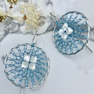 Silver earrings with blue crochet and mother of pearl flower