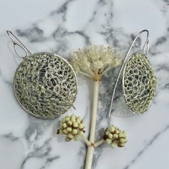 Silver unusual round earrings with gold and grey crochet