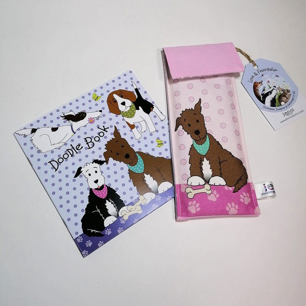 Brown dog in a turquoise bandana Doodle Kit, stationery set. Comprising of a lined handmade cotton pink pouch, 8 colouring pencils and a 20 page sketchbook.