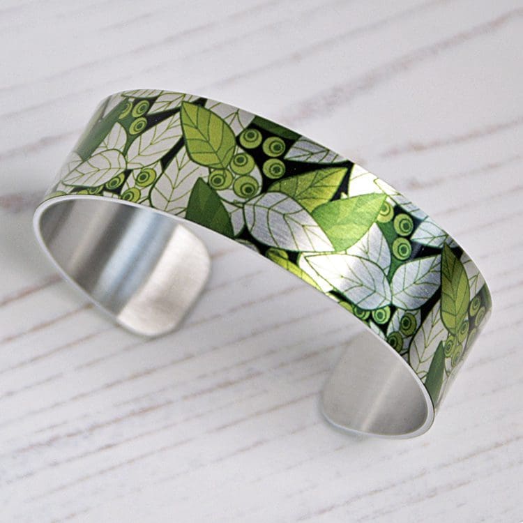 olive green handmade jewellery with leaves, aluminium metal bangle, cuff bracelet