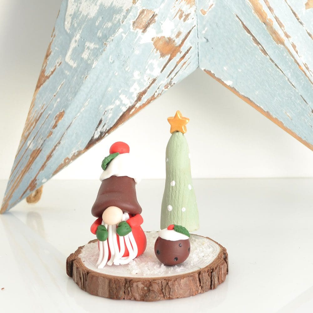 Christmas pudding clay gonk witih pud and Wooden tree set on log slice