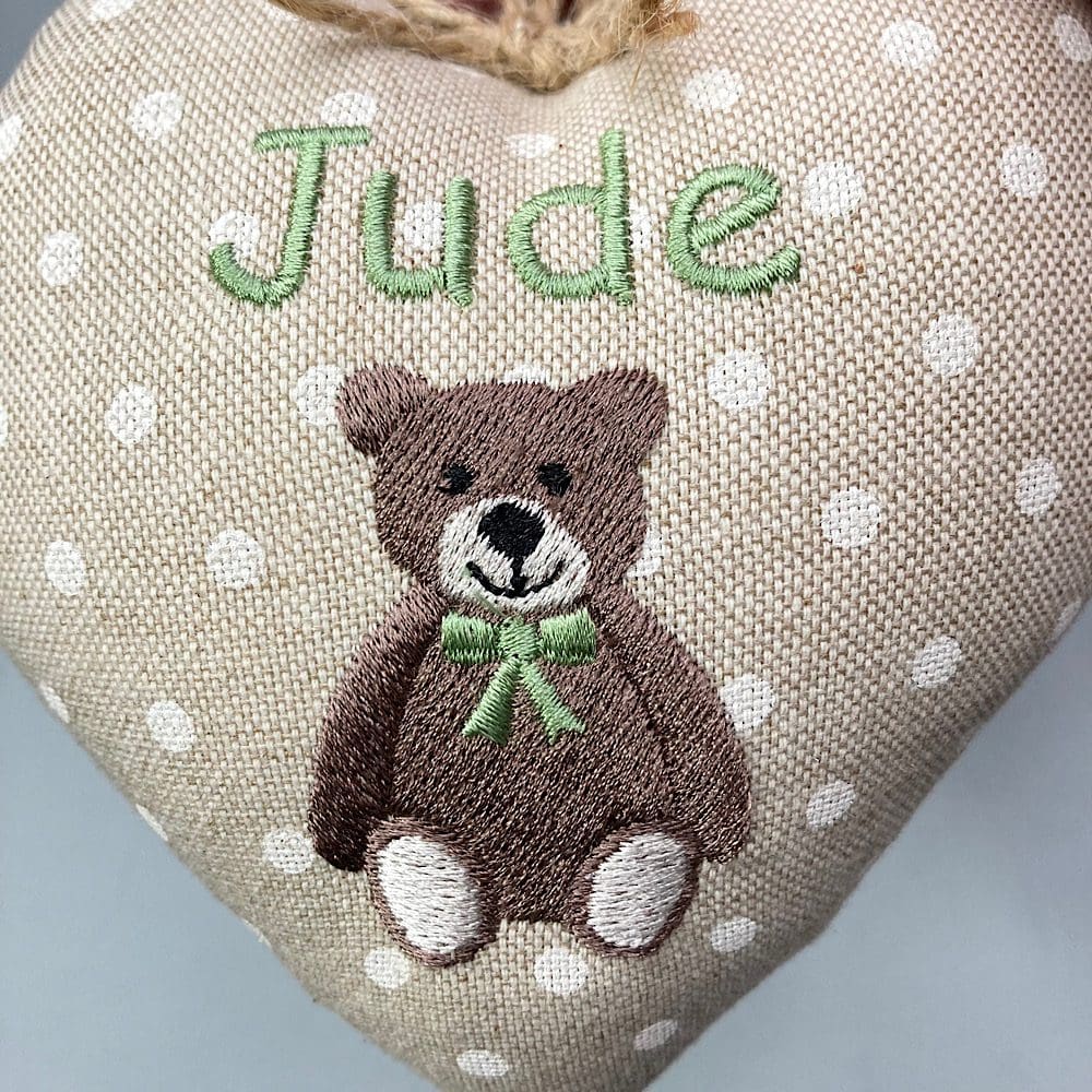 Close up embroidered teddy bear heart