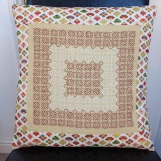 Cream and Brown embroidered cushions