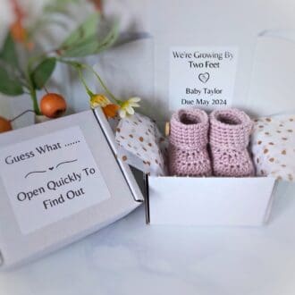 A unique way to announce you're pregnant or the gender of your baby with these handmade baby bootie gift boxes, which can be personalised to mnake you announcement extra special
