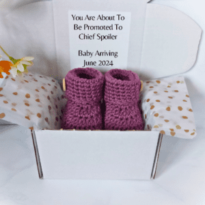 A unique way to announce you're pregnant or the gender of your baby with these handmade baby bootie gift boxes, which can be personalised to mnake you announcement extra special