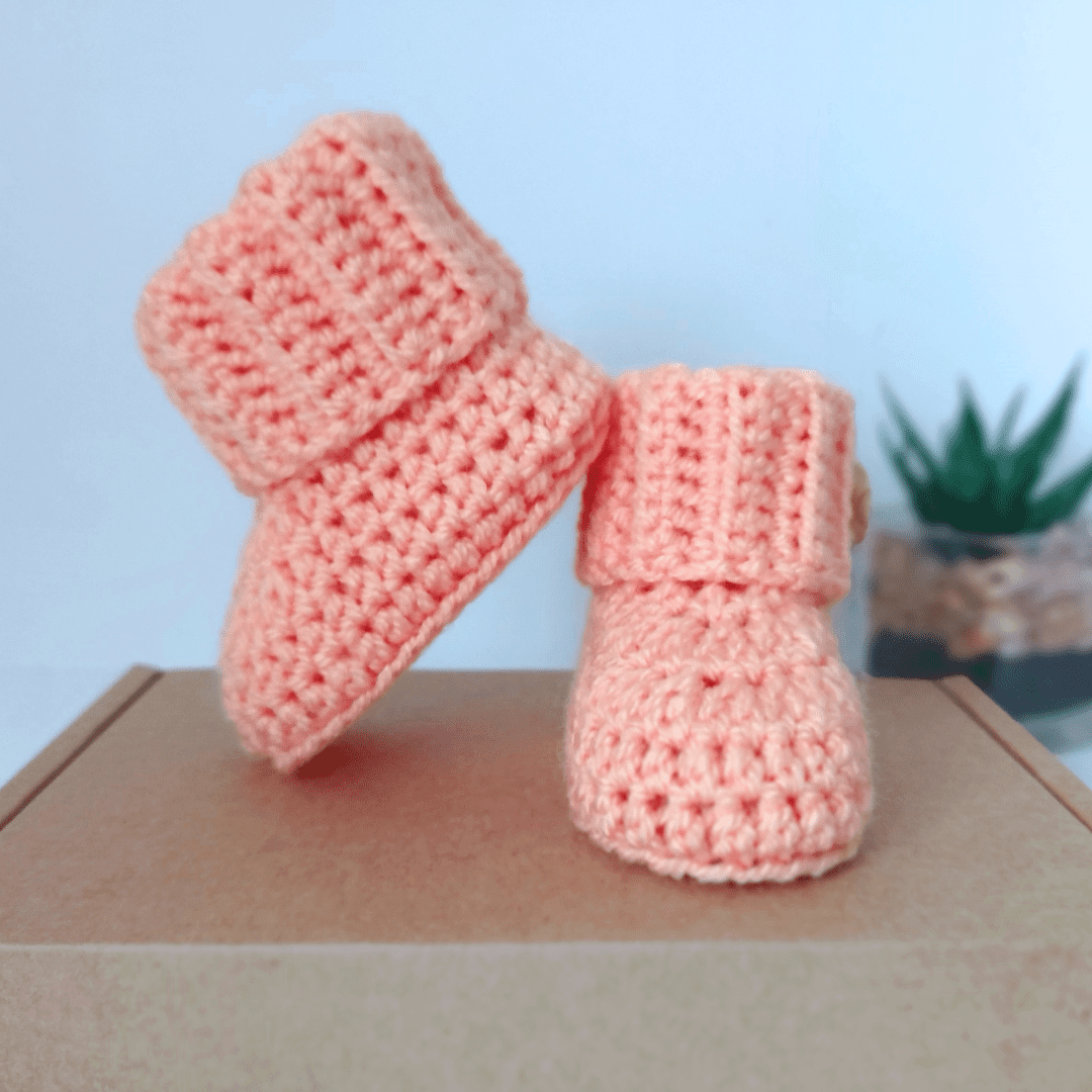 new baby booties in sizes newborn, 0-3 and 3-6 months with a ribbed effect folded cuff, they make a perfect baby shower gift