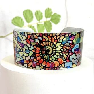 spiral, ammonite, green, orange wide, metal, aluminium, bangle, cuff, bracelet, jewellery, artistic, unusual, handmade UK