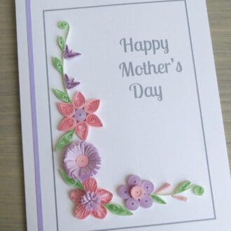 Handmade Mother's Day card with quilled flowers in pink and lilac