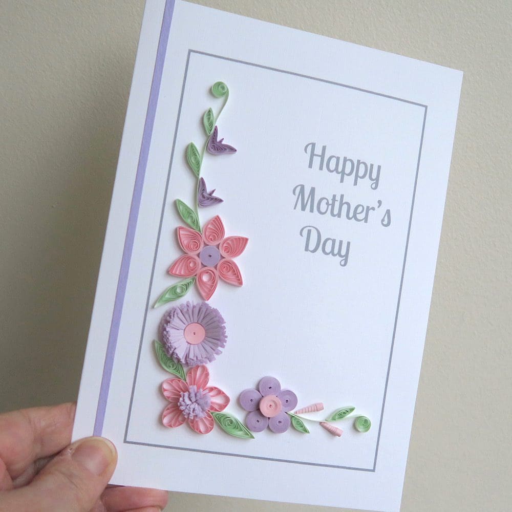 Handmade Mother's Day card with quilled flowers in pink and lilac