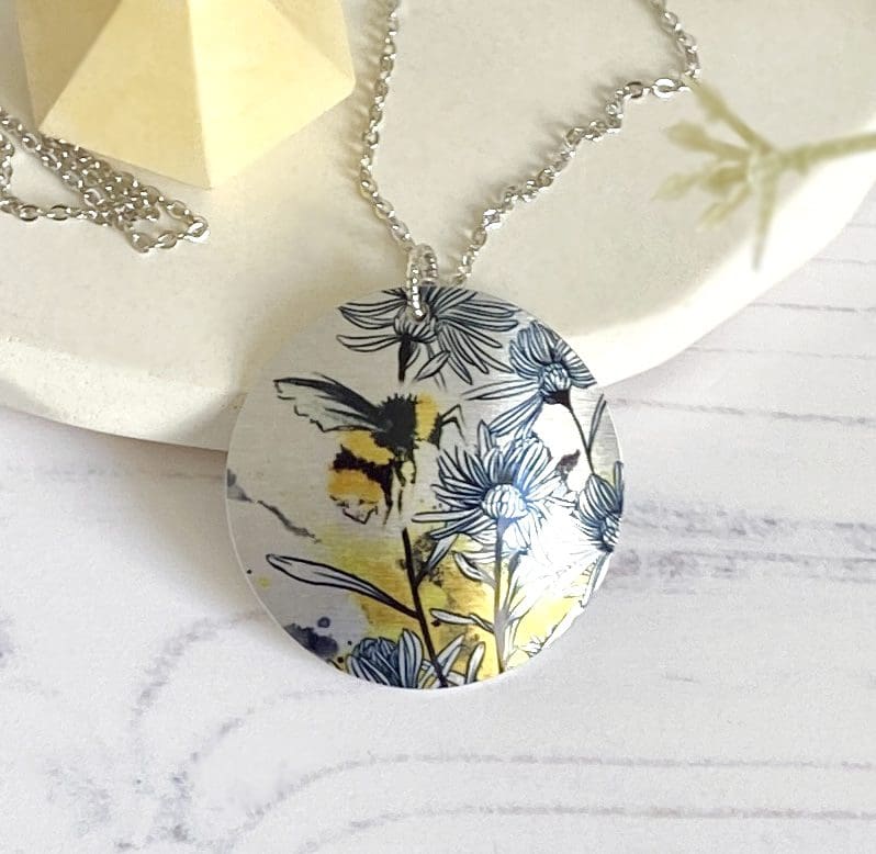 Pendant with yellow bees, insect handmade jewellery, aluminium, metal, round, disc, circle, medallion