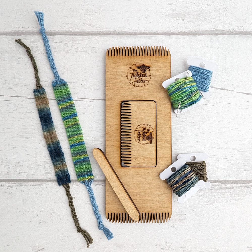 weaving craft kit with green colored thread and friendship bracelet