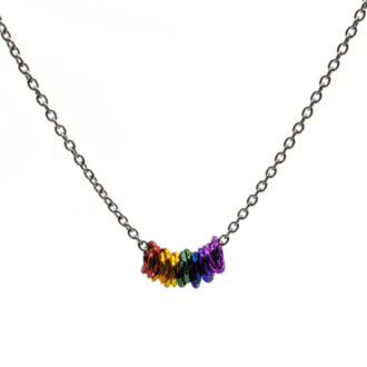 multiple mobius rings in rainbow colours threaded onto a stainless steel chain