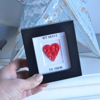 My heart is yours clay heart in black frame freestanding sign