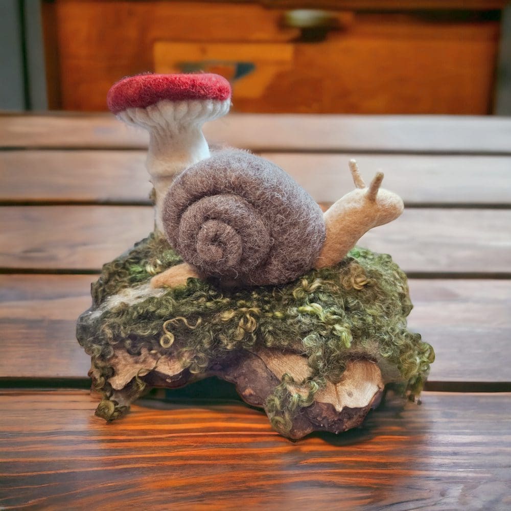 Needle felted snail with toadstool