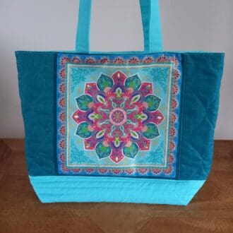 Turquoise mandala print quilted tote bag