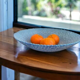 Blue dish with oranges