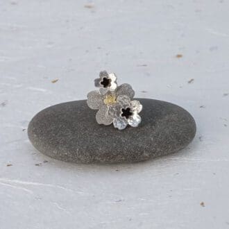 recycled sterling silver, brass and black flowers brooch
