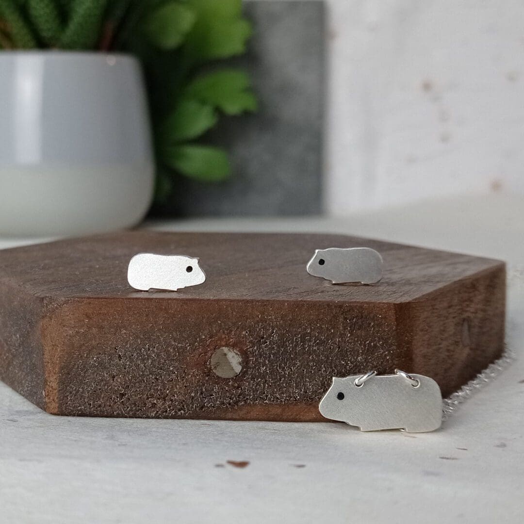 handmade recycled sterling silver guinea pig necklace and stud earrings
