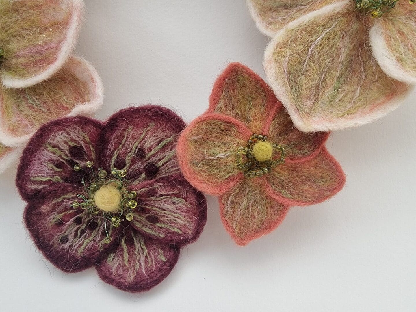 Needle Felted Hellebore Flowers on a ring by Davina Brien- Two Little Hares Designs