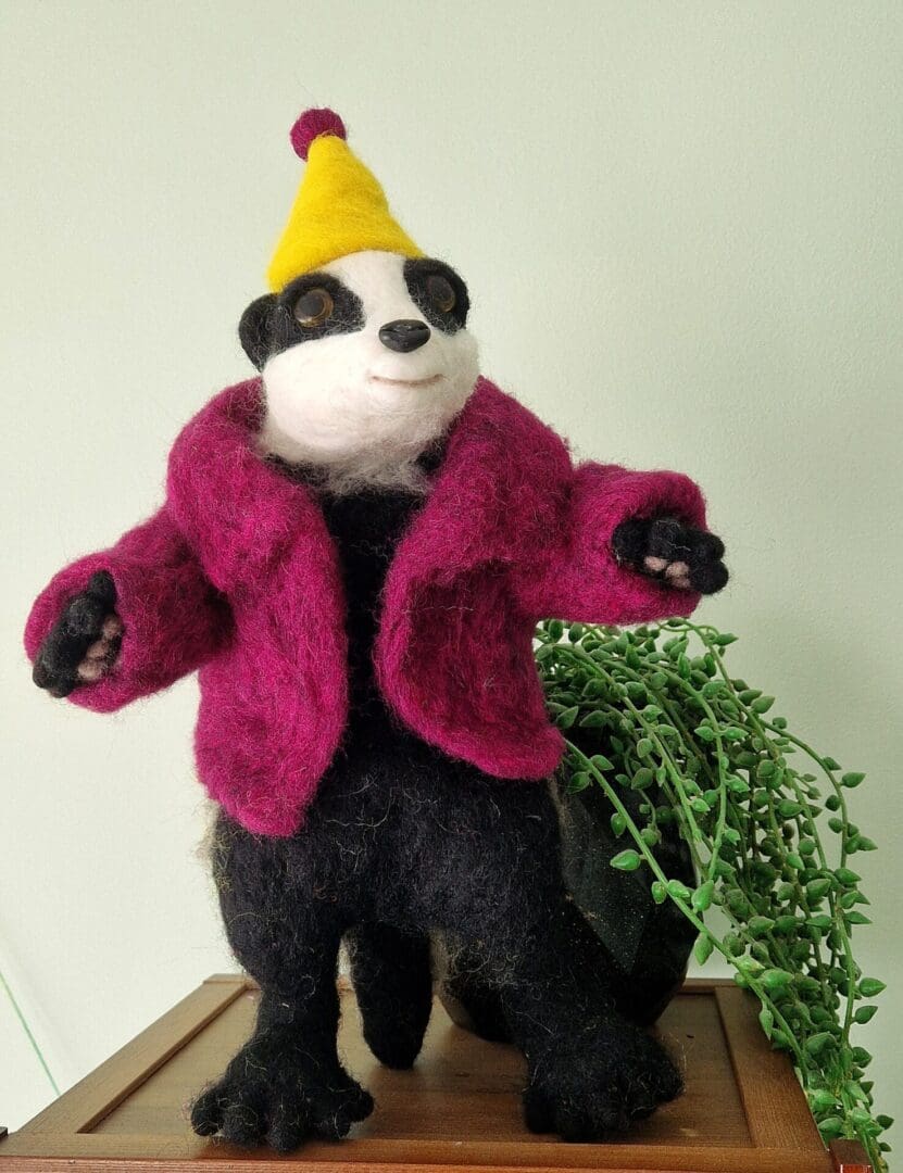 badger in party hat and jacket