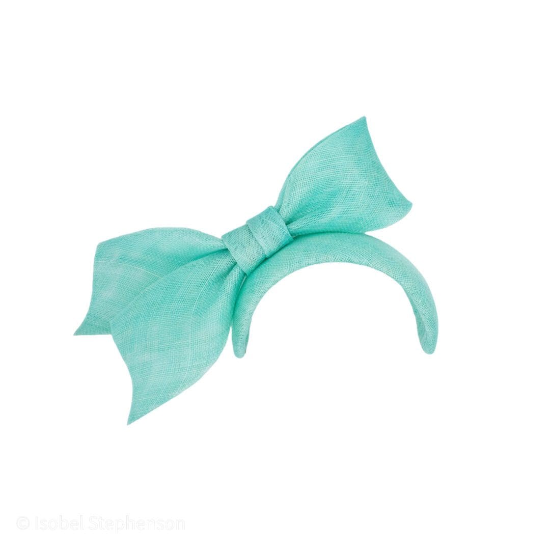 aqua bandeau style occasion hat with large bow trim
