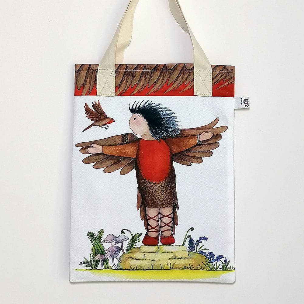 Bird bookbag featuring on the front toddler Michaela trying to fly in her bird costume with a red robin bird offering flying instructions. On reverse is the 'Love and Friendship logo with a little close up of Michaela and Robbie the bird. Feather design trim on top edge and pale cream cotton handles.
