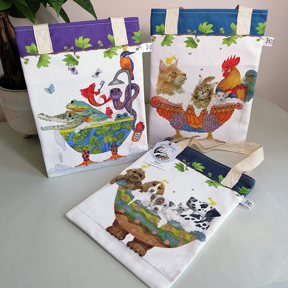 Three of the TubTime range of book bags including reptiles in the tub, cats and cockerels in a bath and the dog bath.