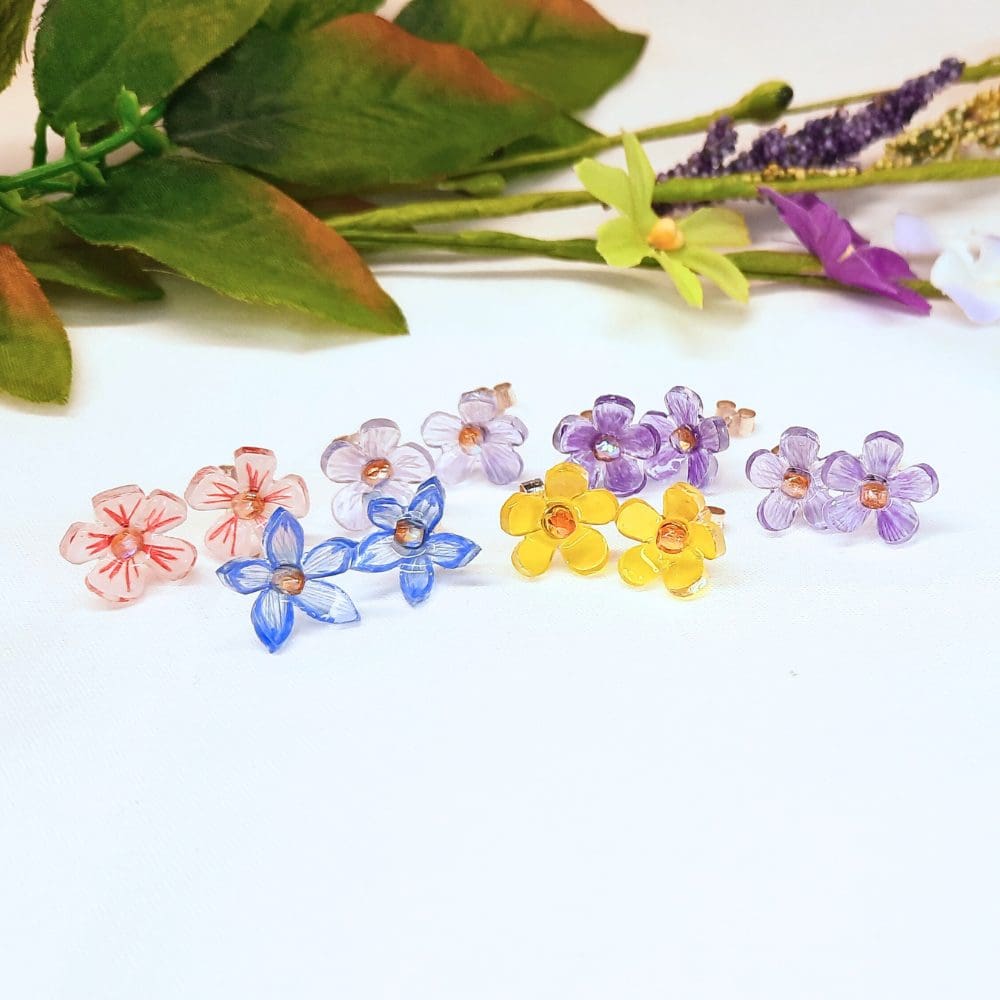 Delicately coloured flower blossom earrings with sterling silver stud fitting.