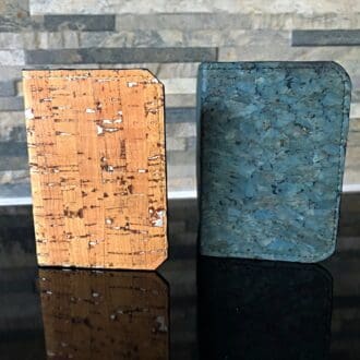 cork card wallets for businees or credit cards in various colours against a brick wall