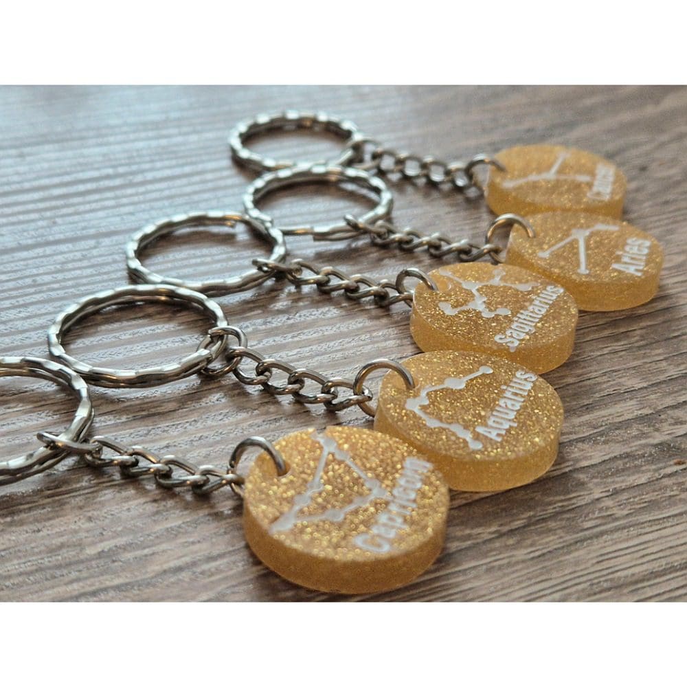 Yellow gold starsign keyrings 7