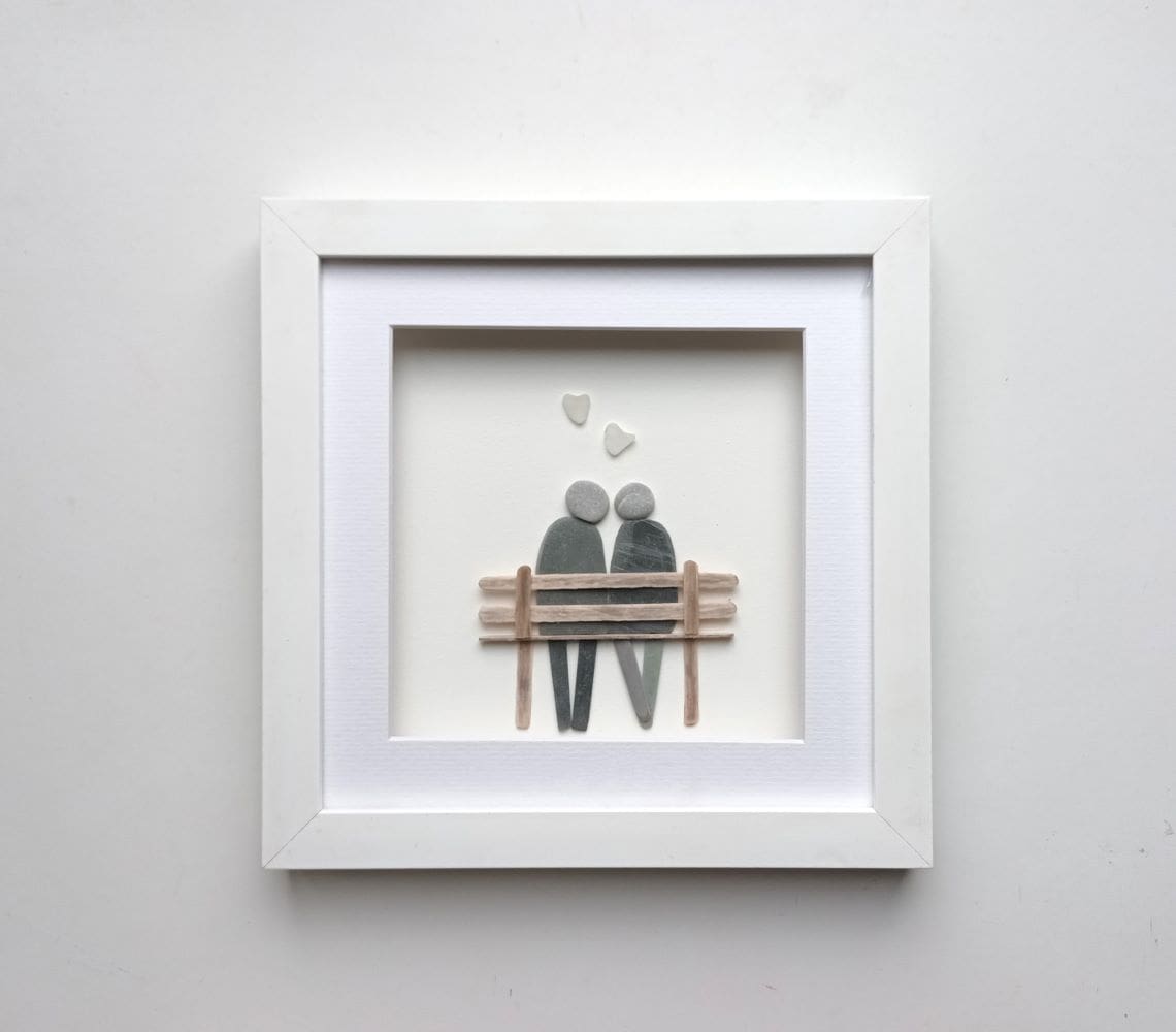 pebble couple sitting on a wooden bench anniversary gift