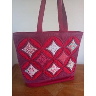 Red and pink layered patchwork bag