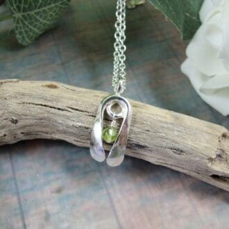 silver and peridot snowdrop necklace