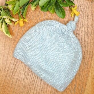 Supersoft baby knitted hat, pale blue with lustre shine.