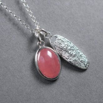 Sterlingg Silver Organic Charm necklace with natural pink Rhodochrosite gemstone. Handmade in the UK with free tracked delivery.