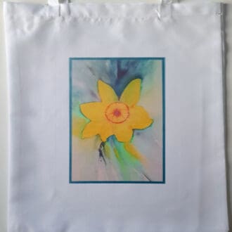 White tote bag with daffodil artwork