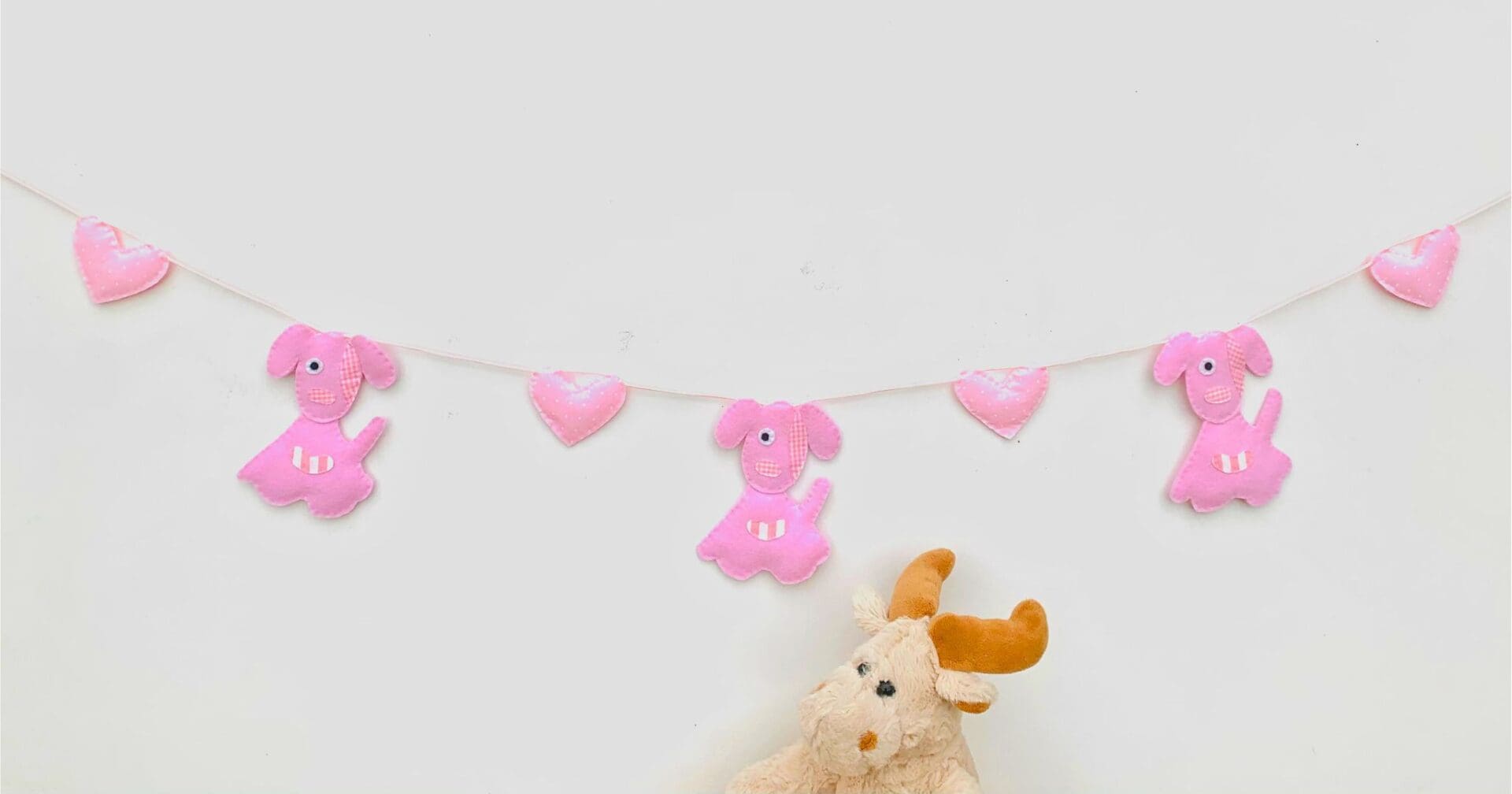 Pink puppy bunting