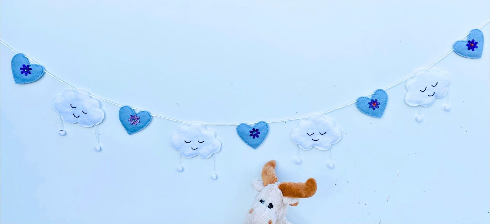 clouds and purple hearts bunting
