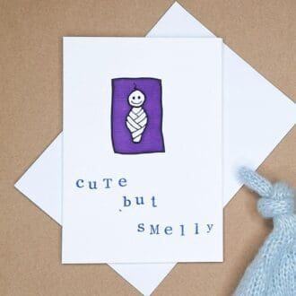 Quirky new baby card with the words 'Cute But Smelly'. Irreverent humour.