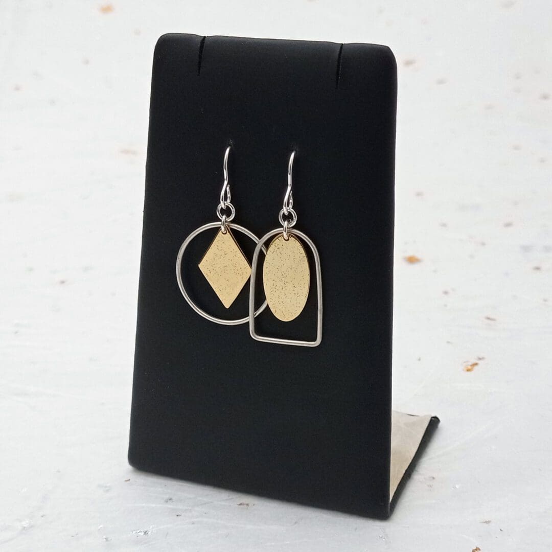 handmade recycled sterling silver and textured brass asymmetrical earrings