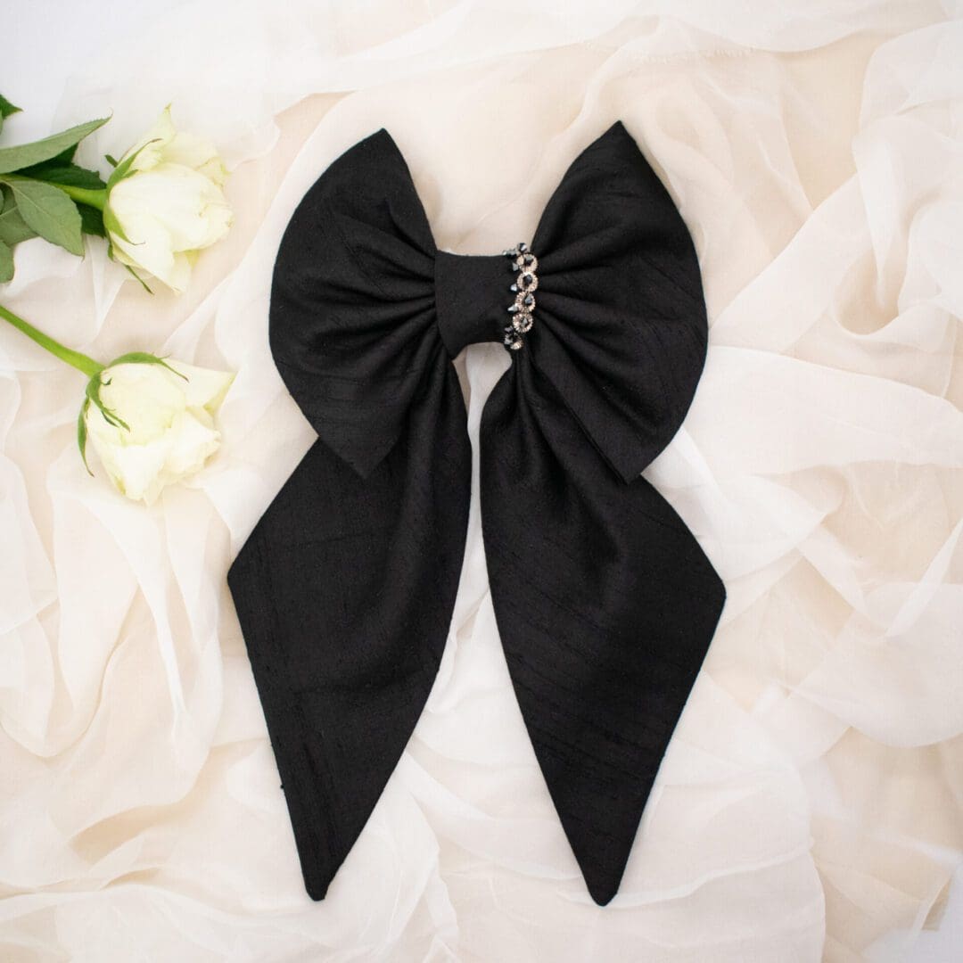 large black silk hair bow with beaded detailing